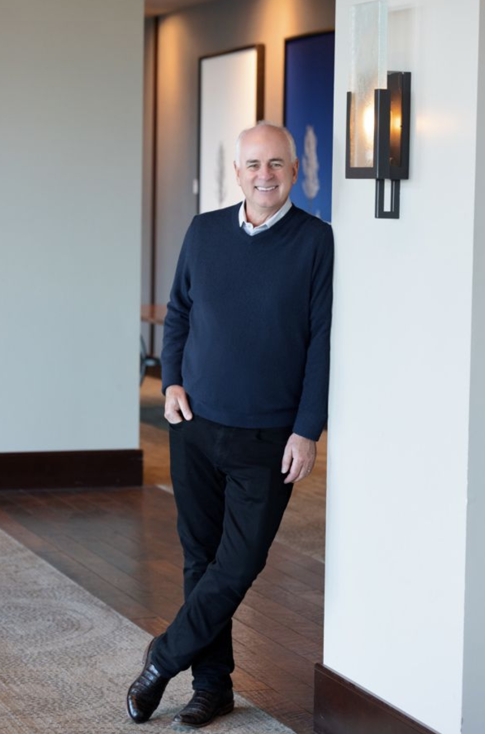 Dan Hoover, founder of Quantum Results, standing in a quiet corridor